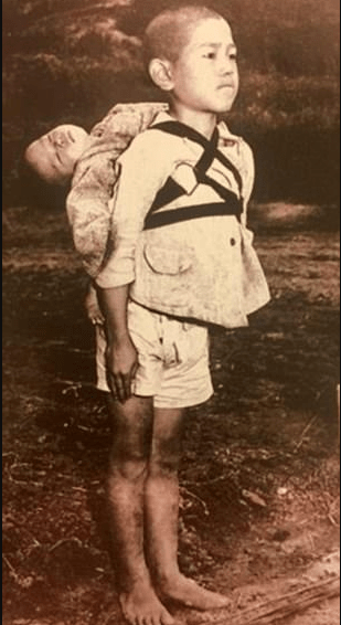 Pope Orders Image Of Boy Carrying His Dead Brother Following The Nuclear Bombing Of Nagasaki Be Printed And Distributed