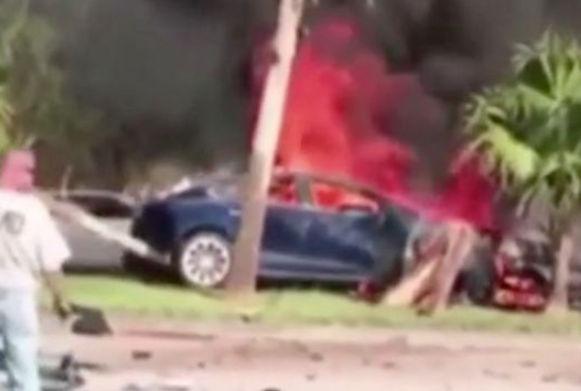 Dad burned to death in Tesla after the electric doors locked him inside burning car, lawsuit alleges