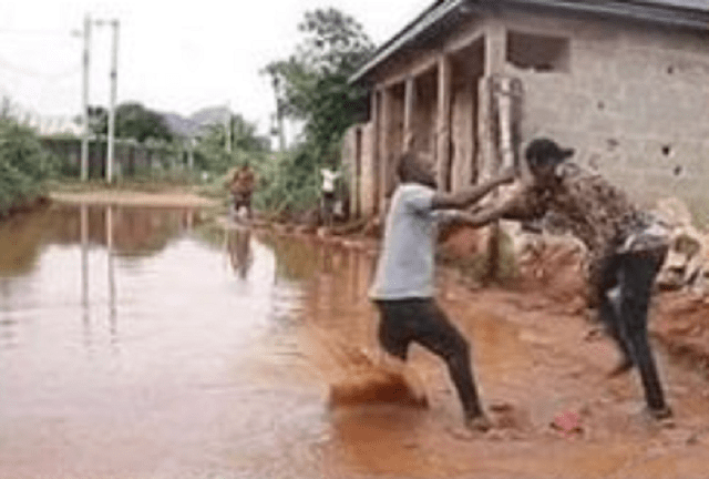 Heartbroken Man, Fights Best Friend in Mud After He Caught Him Sleeping With Fiancée [Photos]