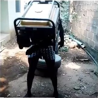 Shocker!!! Nigerian Man Carries Generator With His Teeth [Photos]