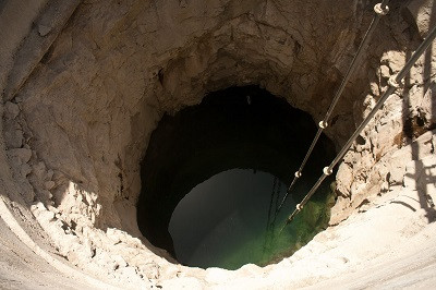 Man kills wife, dumps corpse in well