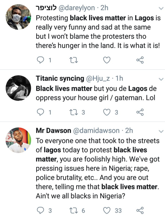 Black Lives Matter protest in Victoria Island, Lagos, draws reactions from Nigerians amidst rainy weather