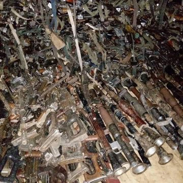 Nigerian soldiers spotted hailing soldiers from Chad as their President lead them to war against Boko Haram, see stash of arms recovered (videos/photos)