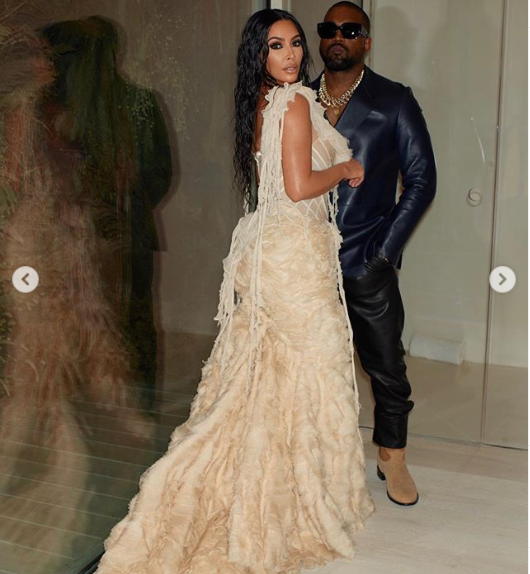 Kim Kardashian stuns in extravagant gown as she attends the Oscars after-party with husband Kanye West (Photos)