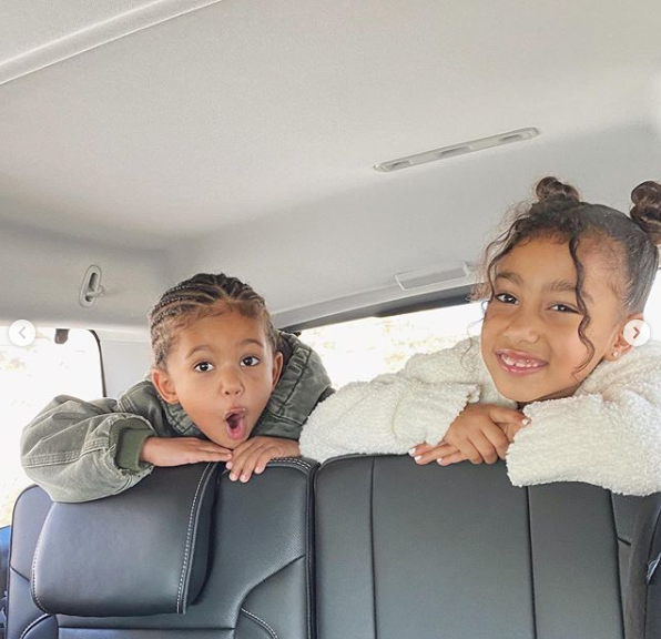 Kim Kardashian reveals North and Saint West have gotten over their sibling rivalry phase as she releases new photos of them getting along
