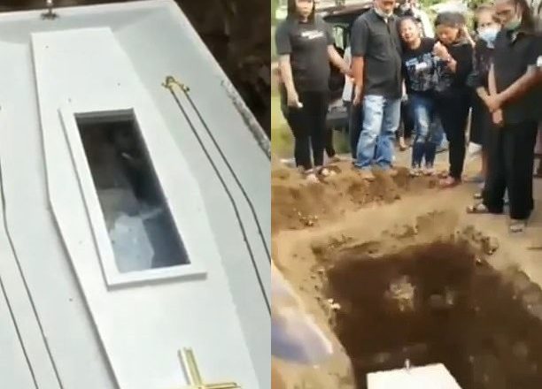 Buried alive? Video goes viral depicting the eerie moment a corpse seems to wave to mourners through glass panel of coffin