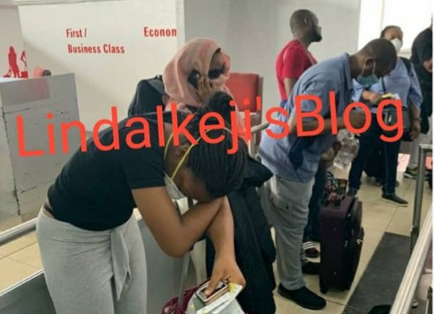 Canadian nationals waiting to be evacuated from Nigeria express frustration after waiting for hours for a flight that is "not free" (photos/video)