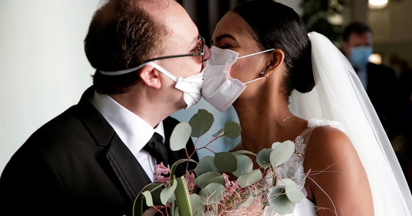 Photos Show Newlyweds Kissing Through Protective Masks at Their Wedding in Italy Amid Coronavirus Outbreak