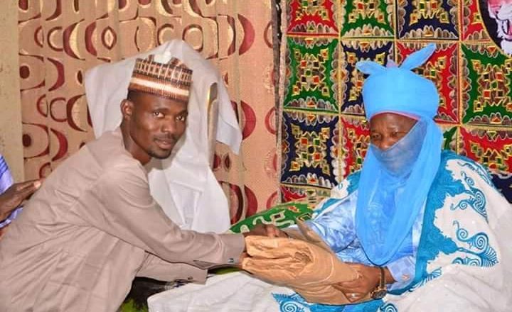 Emir of Rano confers traditional title to the man who trekked from Katsina to Kano in celebration of Governor Ganduje's victory at Supreme Court