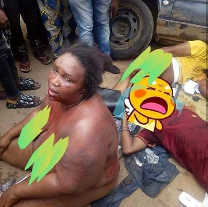 Female robber stripped and disgraced alongside her accomplices after they were caught robbing along Benin-Auchi road