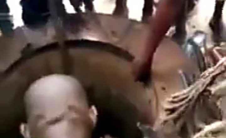 Moment baby is brought out alive after falling into open well (video)