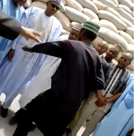 Moment man was restrained after he charged towards President Buhari in Argungu (video)