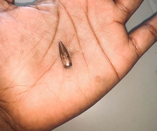 Nigerian Lady and Her Children Have a Narrow Escape from Death as Stray Bullet Pierces Through Their Wall (See Photos)