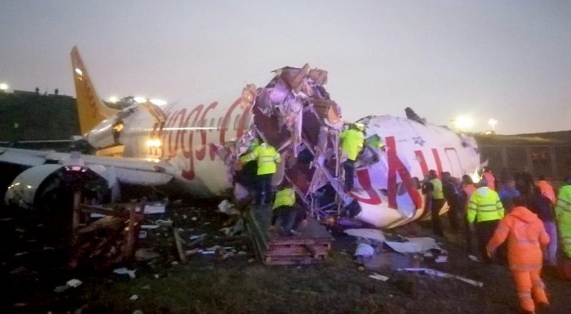 The plane, carrying 171 passengers, splits into three pieces after skidding off the runway in Istanbul (Photos/Video)