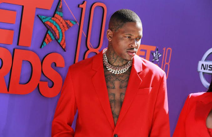 Rapper YG arrested for robbery after raid at his home