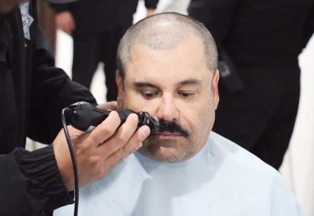 Rare video emerges of Mexican drug lord El Chapo receiving haircut inside high security prison cell