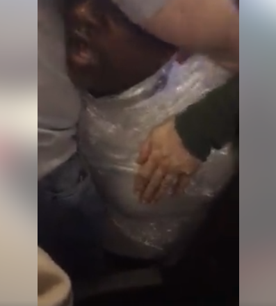 Turkish officials ignite outrage after wrapping African man in nylon for deportation (video)