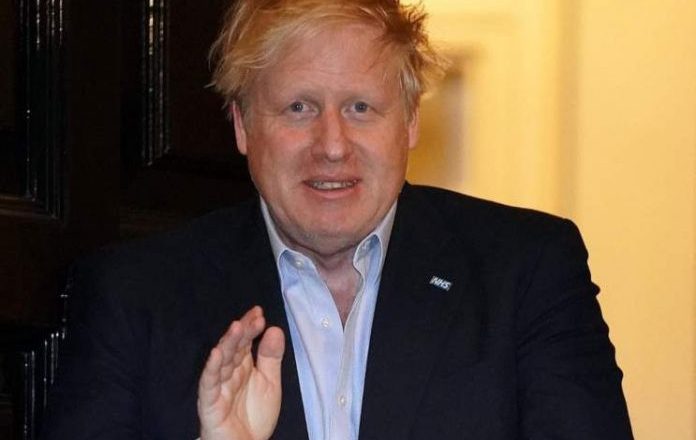 Update: Coronavirus stricken Boris Johnson 'improving' and 'sitting up in bed'