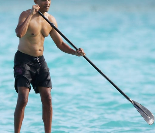 Barack Obama Spotted Paddleboarding Shirtless in Hawaii