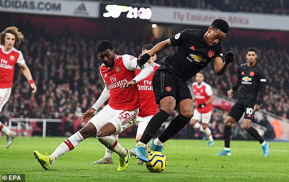 Amazing Arsenal beat Manchester United 2-0, handing Mikel Arteta his first win as manager (Match round-up photos)