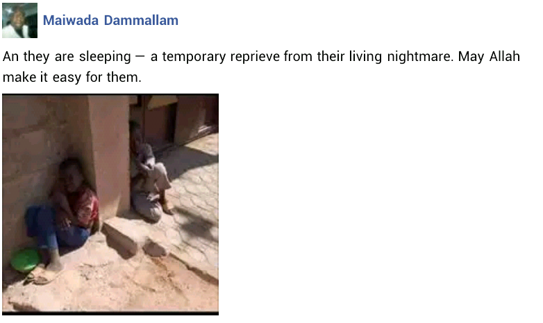  Sad photo of two Almajiri children shivering in the cold as they sleep on the street