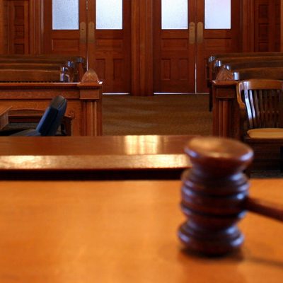 Court Appearance of a Woman Accused of Assaulting Her Husband