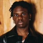 <div id="mvp-content-main">
Rema issues a warning to record labels: ‘Stop trying to clone me’