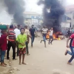 Mob burn two suspected motorcycle snatchers to death in Benue
