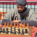 Nigerian chess master, Tunde Onakoya, perseveres through health challenges in marathon, supported by New York NGO