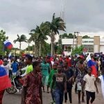 Protest Sparks Outrage as Russian Flags Surface, CSOs Push for Action