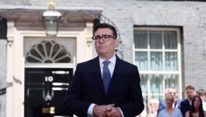 Andy Burnham takes office as Prime Minister of the United Kingdom and promises "a new political model"