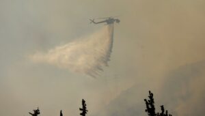 Two people die when two helicopters collide while working against fires in Greece