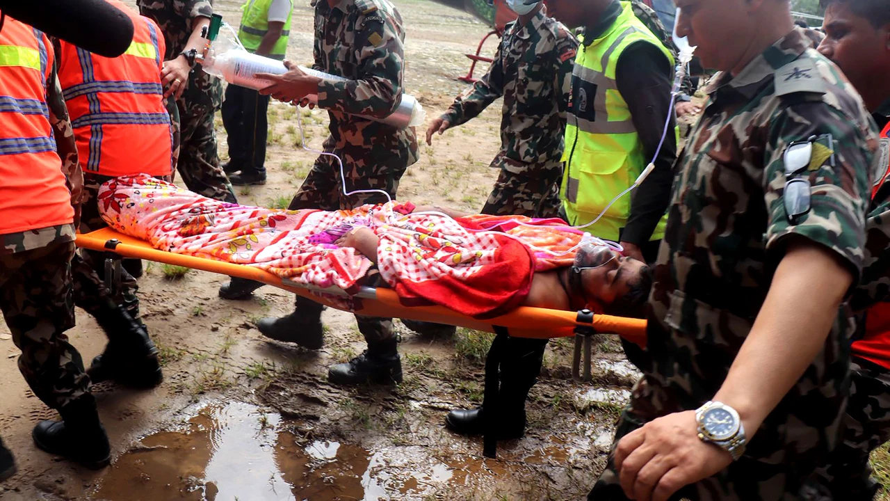 Nepal rescues two tunnel workers alive after ten days trapped by the flood