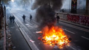 Paris decrees curfew and bans demonstrations in several areas after weekend riots